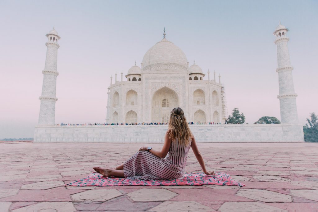 'Girl in front of Taj Mahal'- Best way to travel India: solo or group tour