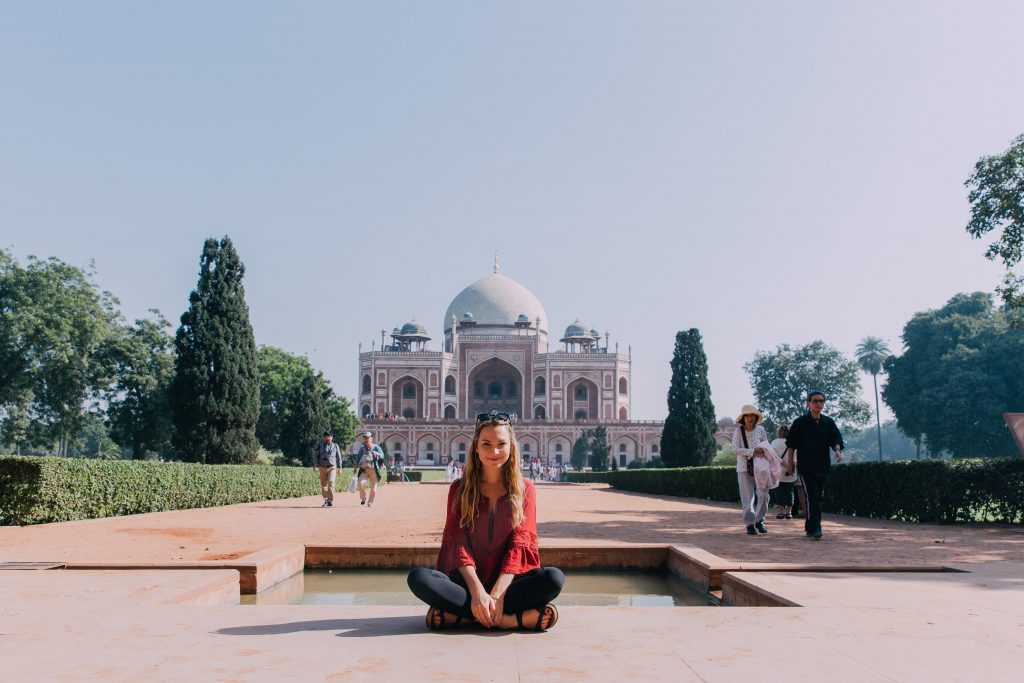 'Girl in front of Humayun's Tomb'- The best way to travel India: solo or group tour