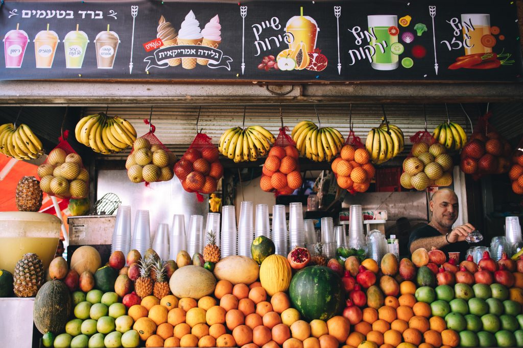 Unique Things To Do in Tel Aviv: Carmel Market Stall